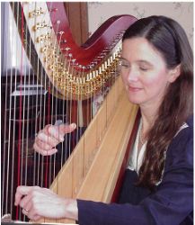 Susan at her harp 
(Click on Picture to View Full Size)